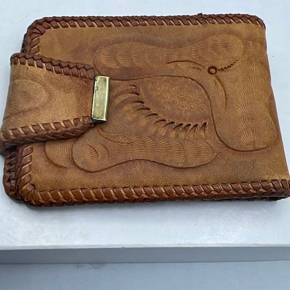 Vintage Handtooled leather Men’s wallet .
